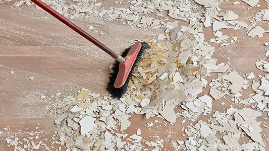 Fine remodel dust wiped from new kitchen cabinets