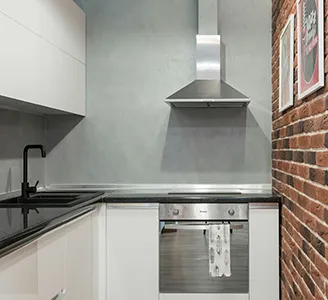 New kitchen cabinets and appliances wiped clean after a build